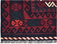 A handmade Afghan Maimana kilim featuring geometric patterns in red, black, and cream wool.