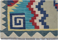 Handwoven Afghan Maimana kilim featuring a geometric pattern in blue, red, yellow, and cream.