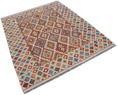 Handwoven Afghan Maimana kilim rug featuring a colorful geometric diamond pattern in wool.