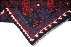 A handmade Afghan Maimana kilim featuring a geometric pattern in red, blue, and dark tones.