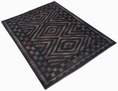Handwoven Afghan Maimana kilim rug featuring a dark geometric diamond pattern in wool.