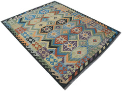 Handwoven Afghan Maimana kilim rug featuring a colorful geometric pattern on a flatweave wool base.