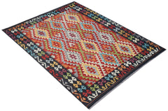 Handwoven Afghan Maimana kilim rug featuring a colorful geometric diamond pattern on a dark border.