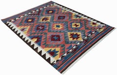 Handwoven Afghan Maimana kilim rug featuring a colorful geometric diamond pattern.