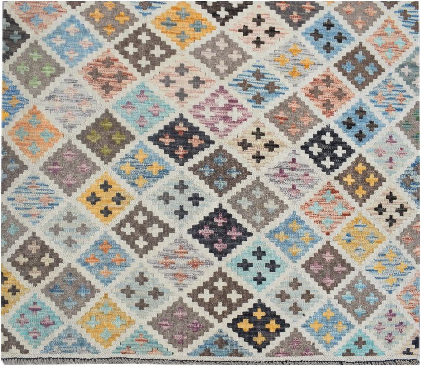 Handmade Afghan Maimana kilim rug featuring a colorful geometric diamond pattern.
