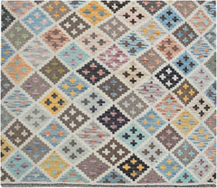 Handmade Afghan Maimana kilim rug featuring a colorful geometric diamond pattern.