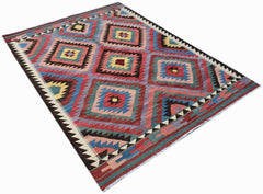 Handmade Afghan Maimana kilim rug featuring a colorful geometric diamond pattern.