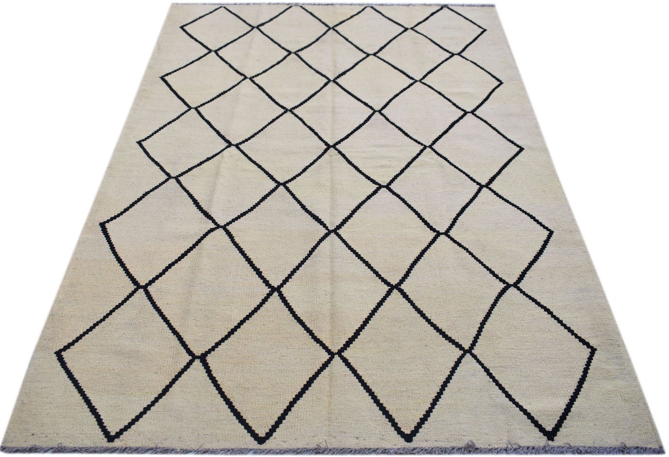 Handmade Afghan Maimana kilim rug featuring a cream background with a black diamond pattern.