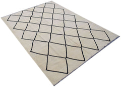 Handwoven Afghan Maimana kilim rug featuring a cream background with a black diamond pattern.