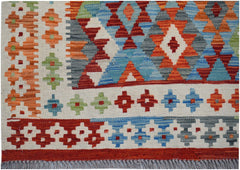 Handwoven Afghan Maimana kilim featuring a vibrant geometric pattern in wool.