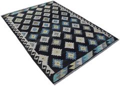 Handwoven Afghan Maimana kilim rug featuring a black field with repeating geometric motifs.