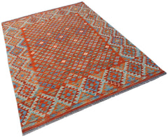 Handwoven Afghan Maimana kilim rug featuring a geometric diamond pattern in orange and blue tones.