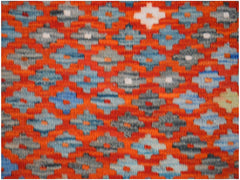 Handwoven Afghan Maimana kilim featuring a repeating geometric diamond pattern in orange and blue.