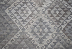 Handwoven Afghan Maimana kilim rug featuring a geometric diamond pattern in natural wool tones.