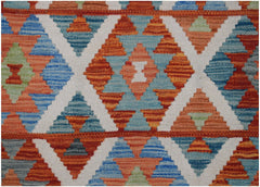 Handwoven Afghan Maimana kilim rug featuring a geometric diamond pattern in vibrant colors.