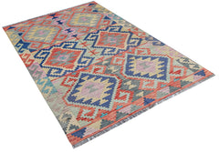 Afghan Maimana Kilim with geometric patterns in blue, red, and yellow.