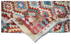 Afghan Maimana Kilim with geometric patterns in red, blue, and cream.