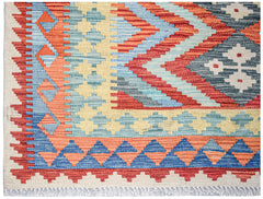 Afghan Maimana Kilim with geometric patterns in red, blue, and yellow.