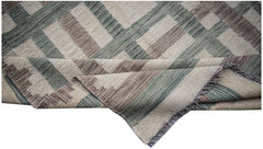 Handwoven Afghan Maimana kilim rug featuring a geometric pattern in muted green, brown, and cream.