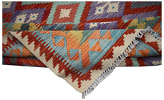 Afghan Maimana Kilim with geometric patterns in red, blue, purple, and orange.