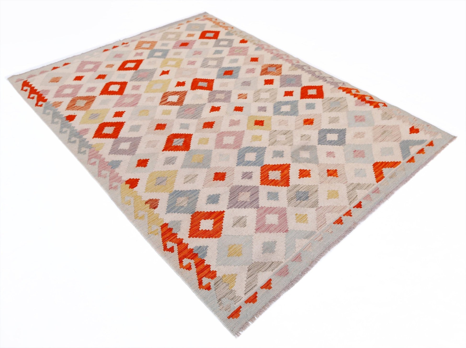 Handwoven Afghan Maimana kilim rug featuring a geometric diamond pattern in multi-colored wool.