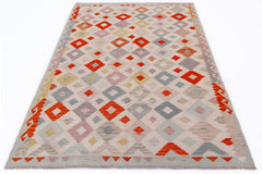Handwoven Afghan Maimana kilim rug featuring a geometric diamond pattern in vibrant colors.