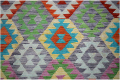 Afghan Maimana Kilim with geometric diamond patterns in multiple colors.