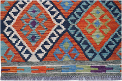 Handwoven Afghan Maimana kilim rug featuring a geometric diamond pattern in vibrant colors.