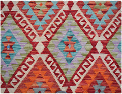 Handwoven Afghan Maimana kilim featuring a geometric diamond pattern in vibrant wool colors.