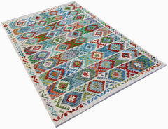 Handwoven Afghan Maimana kilim rug featuring a colorful geometric diamond pattern in wool.