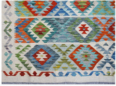 Handwoven Afghan Maimana kilim rug featuring a colorful geometric pattern on a cream background.