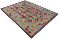 A handmade Afghan Maimana kilim rug featuring a colorful geometric pattern on a flatweave surface.