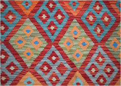 Handwoven Afghan Maimana kilim featuring a vibrant geometric diamond pattern in wool.