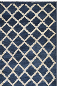 Handmade Afghan Maimana kilim rug featuring a dark blue and cream geometric diamond pattern.