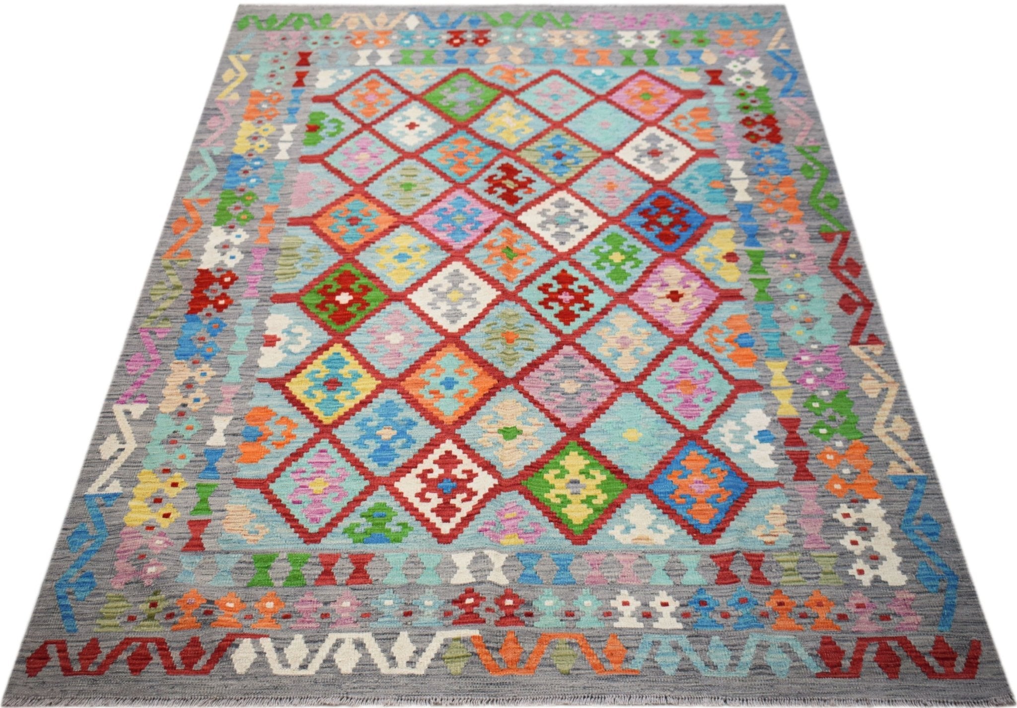 Handwoven Afghan Maimana kilim rug featuring a colorful geometric diamond pattern on a grey field.