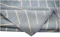 Afghan Maimana Kilim with a blue and white geometric pattern.
