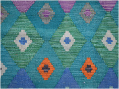 Handwoven Afghan Maimana kilim rug featuring a geometric diamond pattern in vibrant colors.