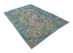 A rectangular Afghan Maimana kilim rug featuring a blue background with colorful geometric patterns.