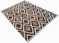 Handwoven Afghan Maimana kilim rug featuring a geometric diamond pattern in brown and cream tones.