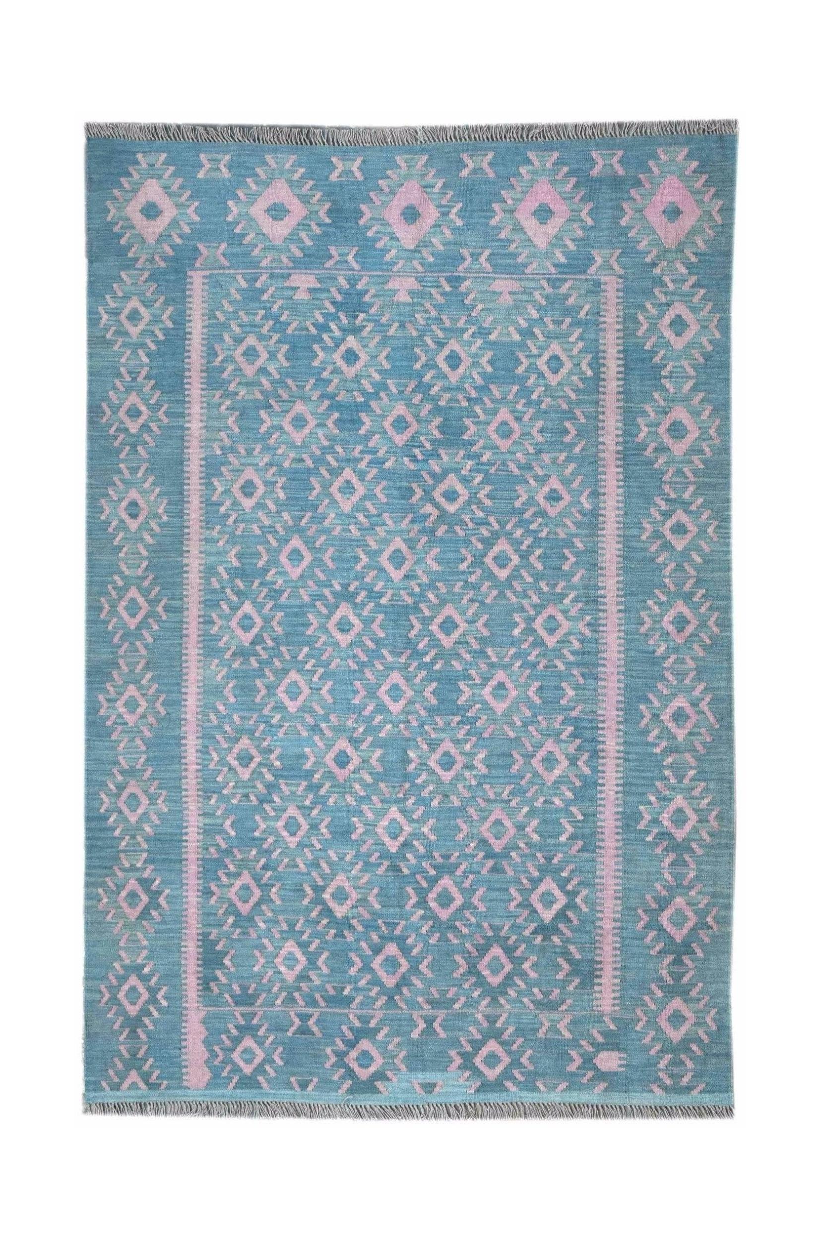 Handmade Afghan Maimana kilim rug featuring a geometric pattern in shades of blue and pink.