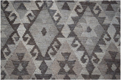 Handwoven Afghan Maimana kilim rug featuring a neutral-toned geometric diamond pattern.