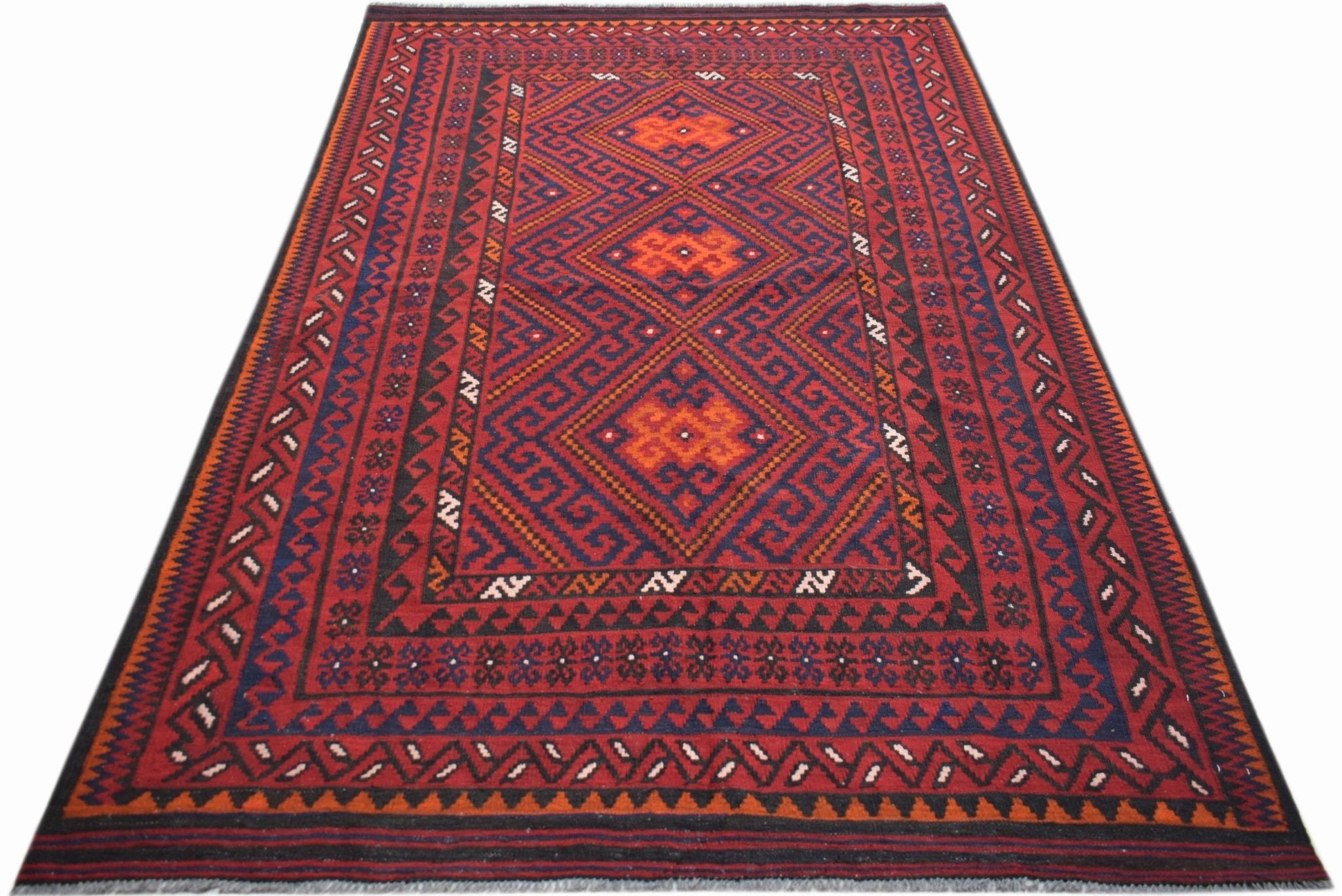 Handwoven Afghan Maimana kilim rug featuring a geometric diamond pattern in red and blue wool.