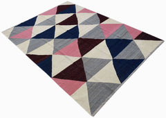 Handwoven Afghan Maimana kilim rug featuring a geometric pattern of blue, pink, grey, and maroon.
