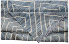 A blue and grey handwoven Afghan Maimana kilim rug featuring a geometric chevron pattern.