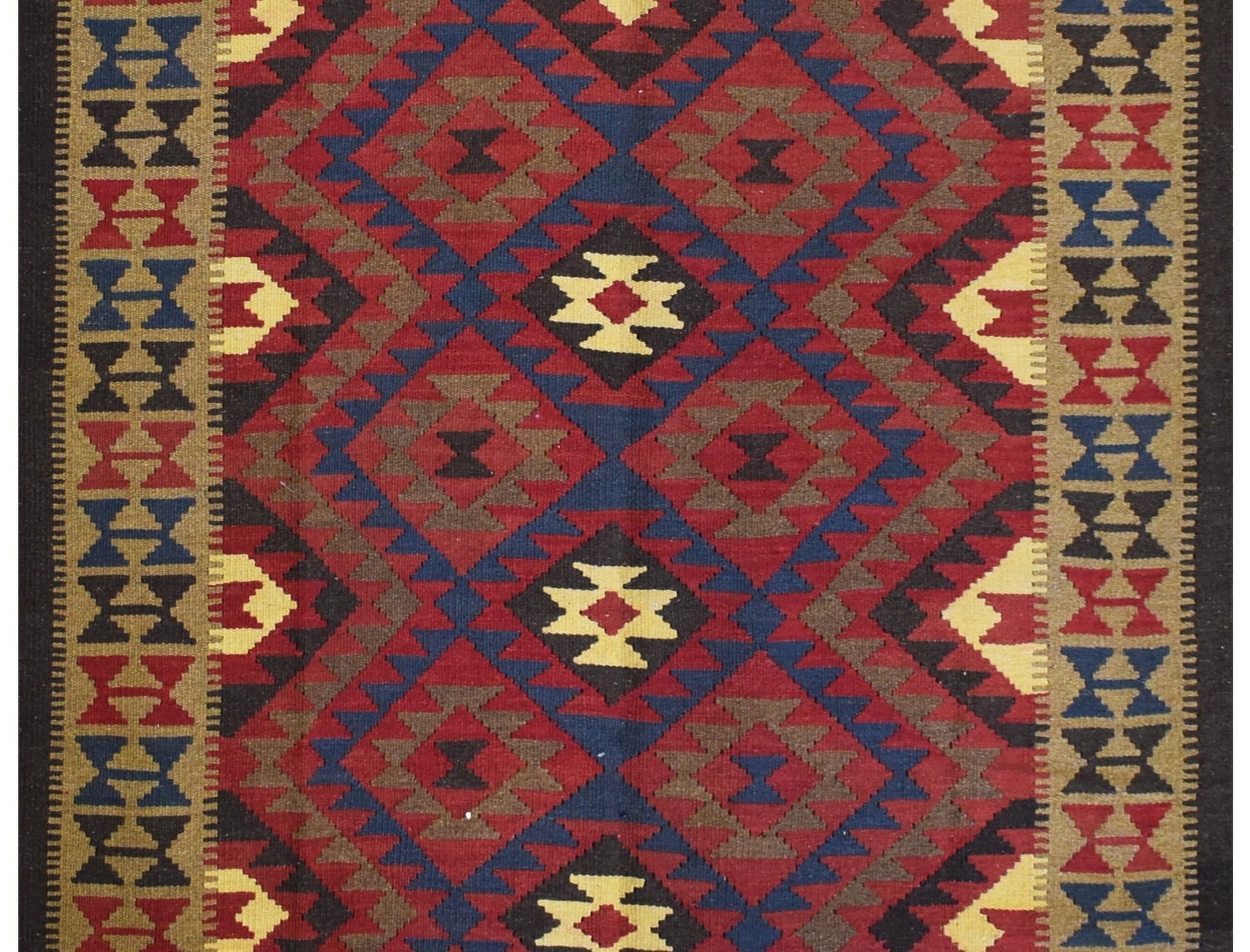 Handmade Afghan Maimana kilim rug featuring a geometric diamond pattern in red, blue, and tan.