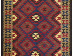 Handmade Afghan Maimana kilim rug featuring a geometric diamond pattern in red, blue, and tan.