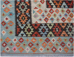 Handwoven Afghan Maimana kilim rug featuring a geometric pattern in blue, orange, and red wool.