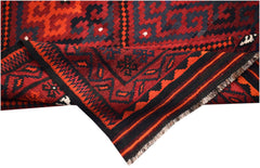 A handwoven Afghan Maimana kilim featuring a geometric pattern in shades of red and black.