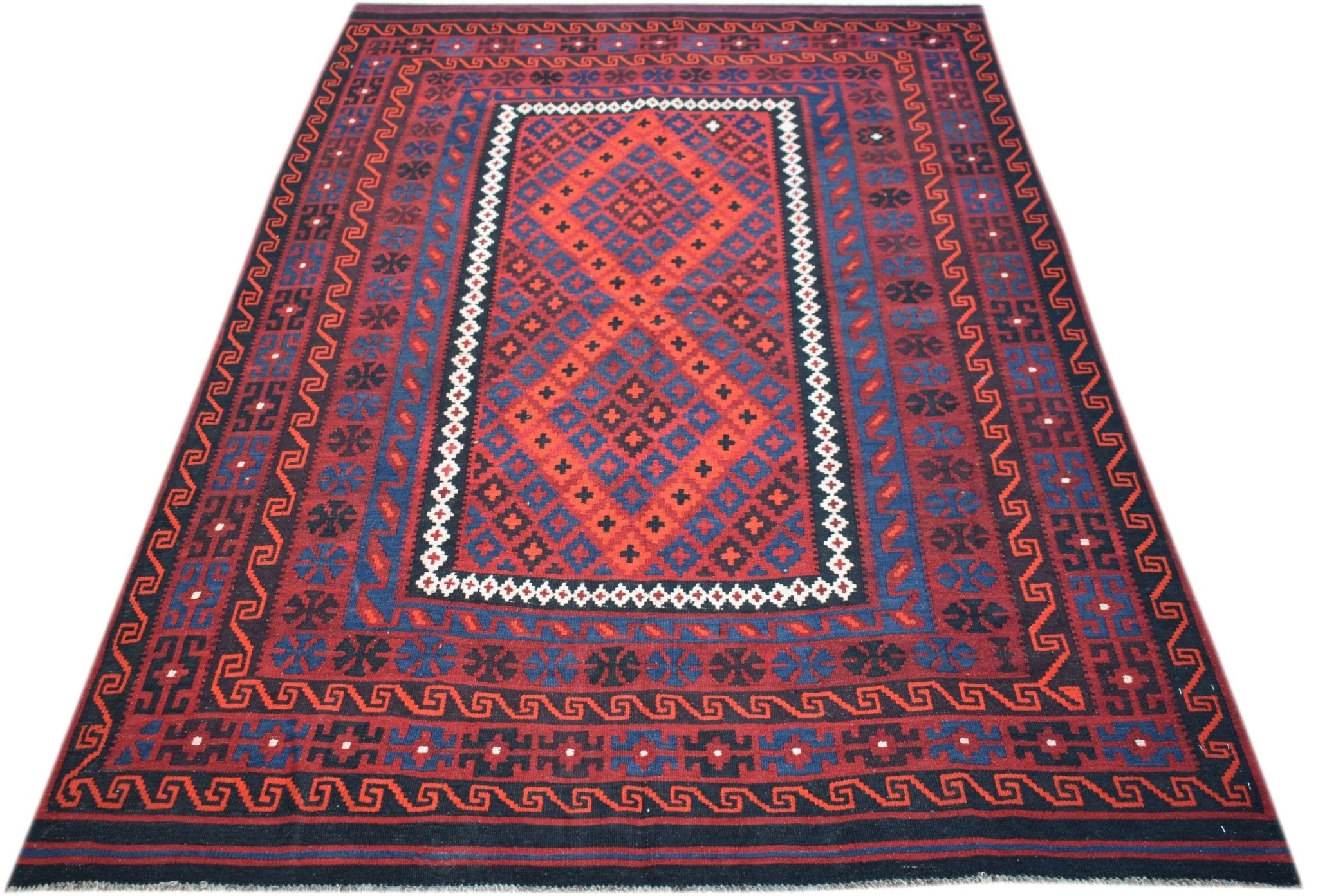 Handwoven Afghan Maimana kilim featuring a geometric diamond pattern in red and blue wool.