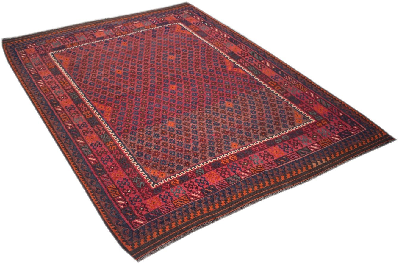 A handmade Afghan Maimana kilim rug featuring a red field with a geometric diamond pattern.